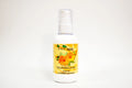 Bottle of calendula oil with a yellow label on a white background
