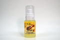 Bottle of organic chia seed oil with a white background