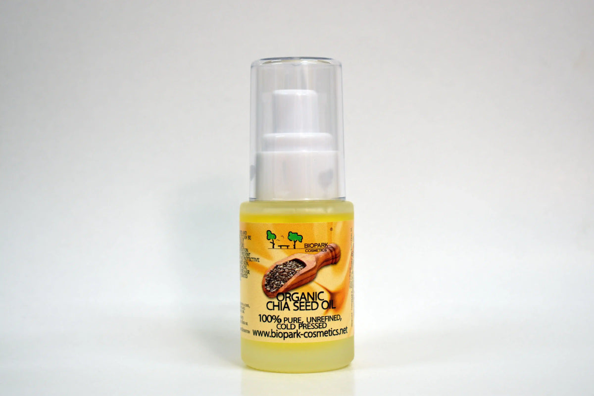Bottle of organic chia seed oil with a white background