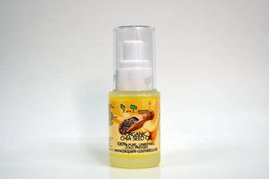 Bottle of organic chia seed oil with a white background