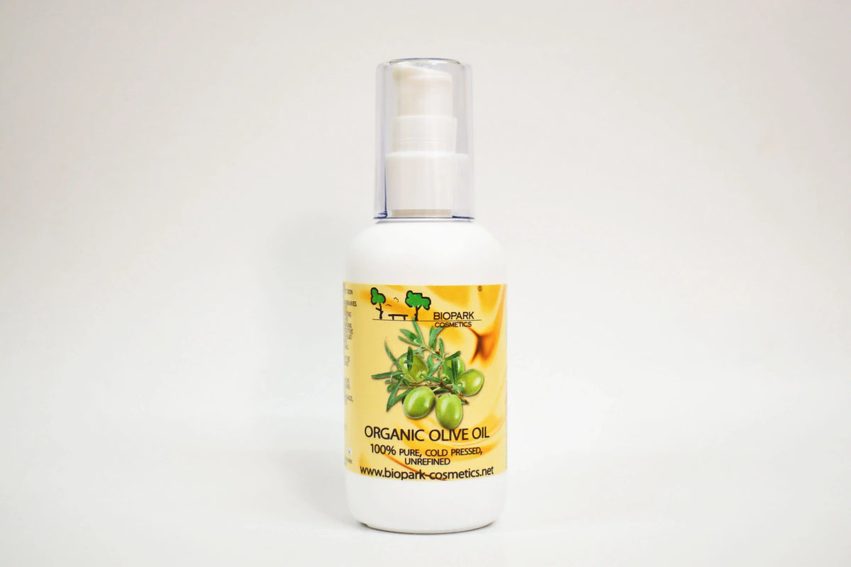 Bottle of organic olive oil with a label on a white background