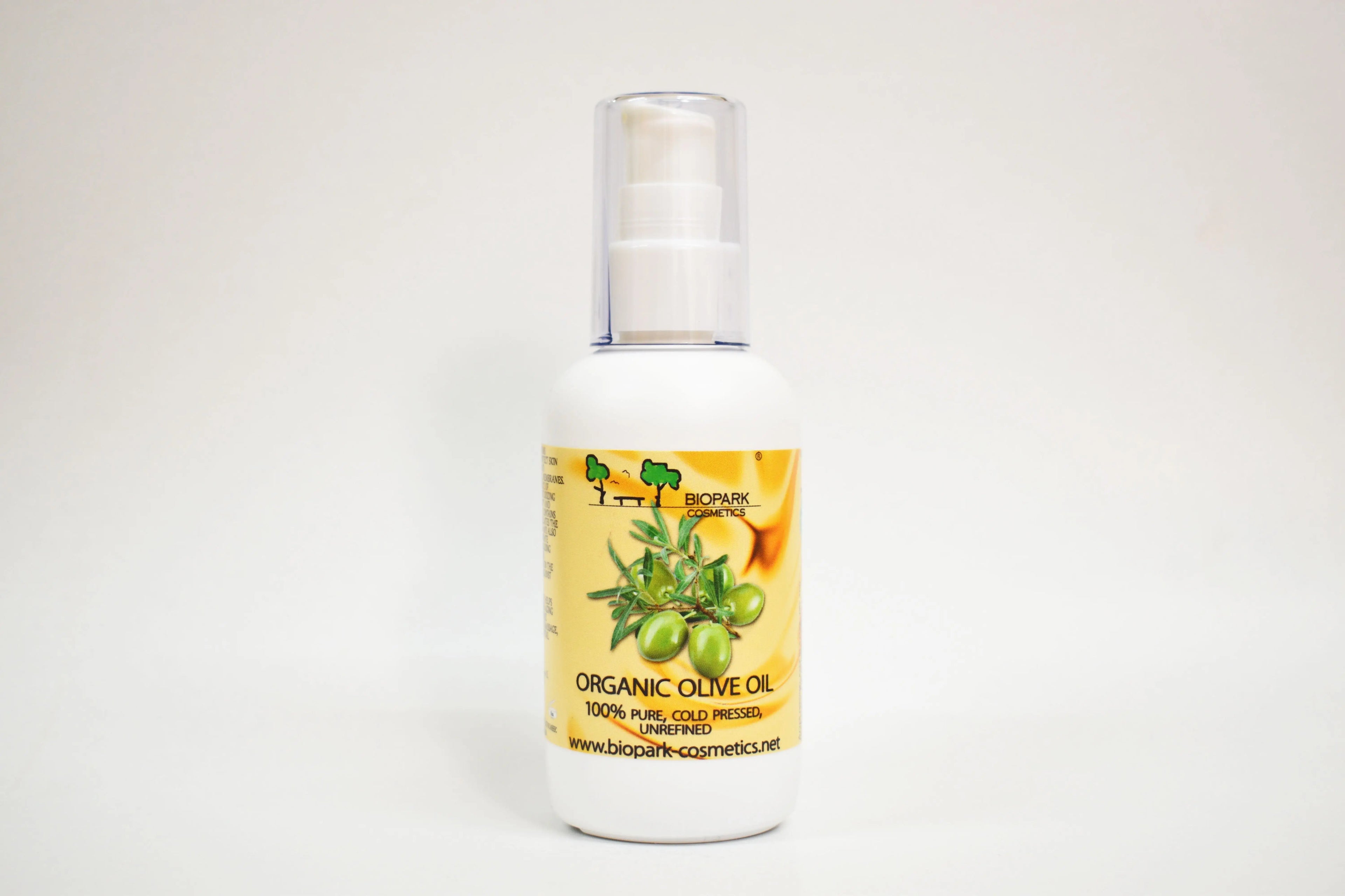 Bottle of organic olive oil with a label on a white background