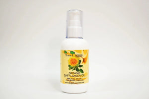 Bottle of organic safflower oil with a yellow label on a white background