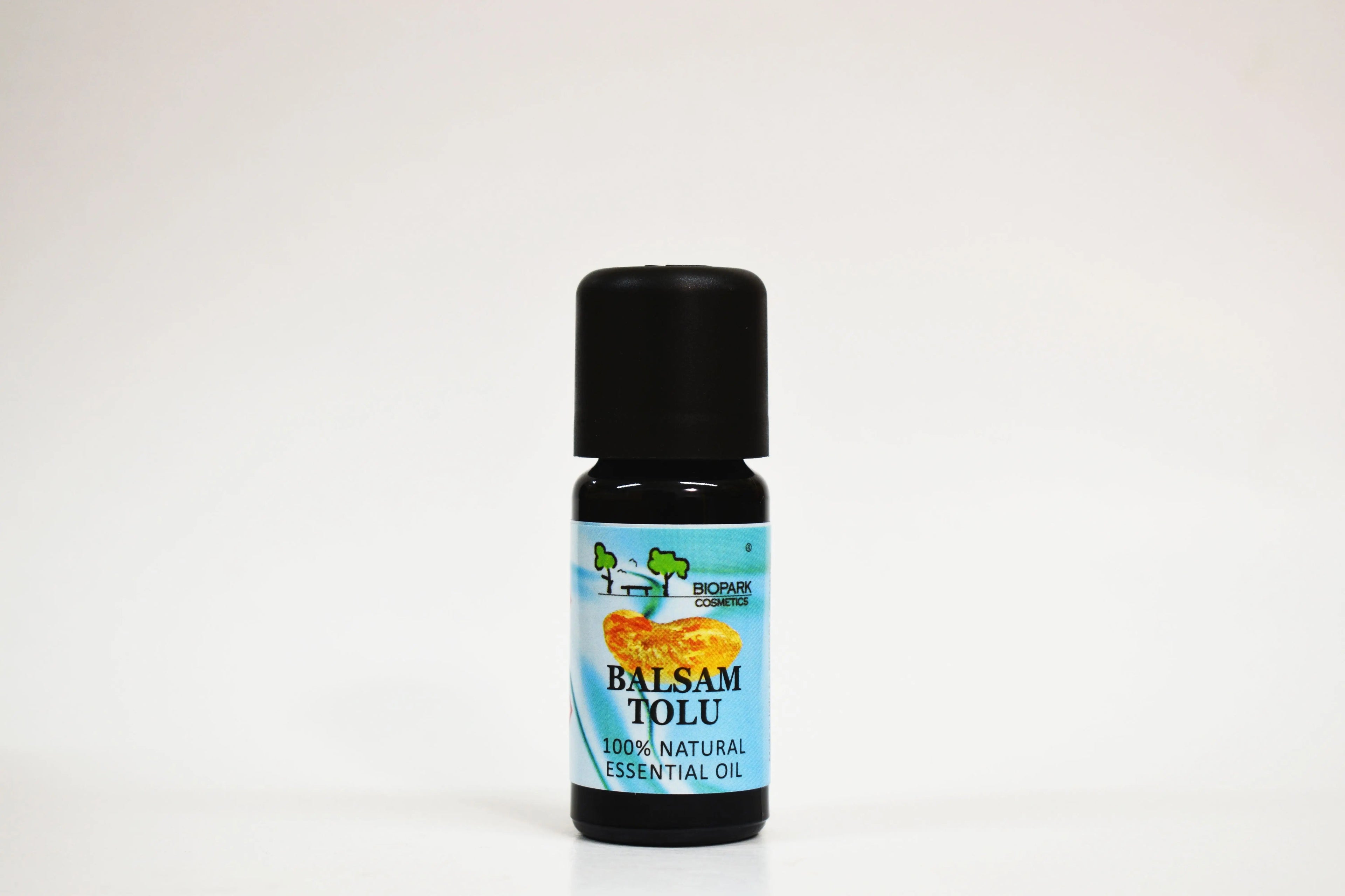 Bottle of Balsam Tolu essential oil on a white background