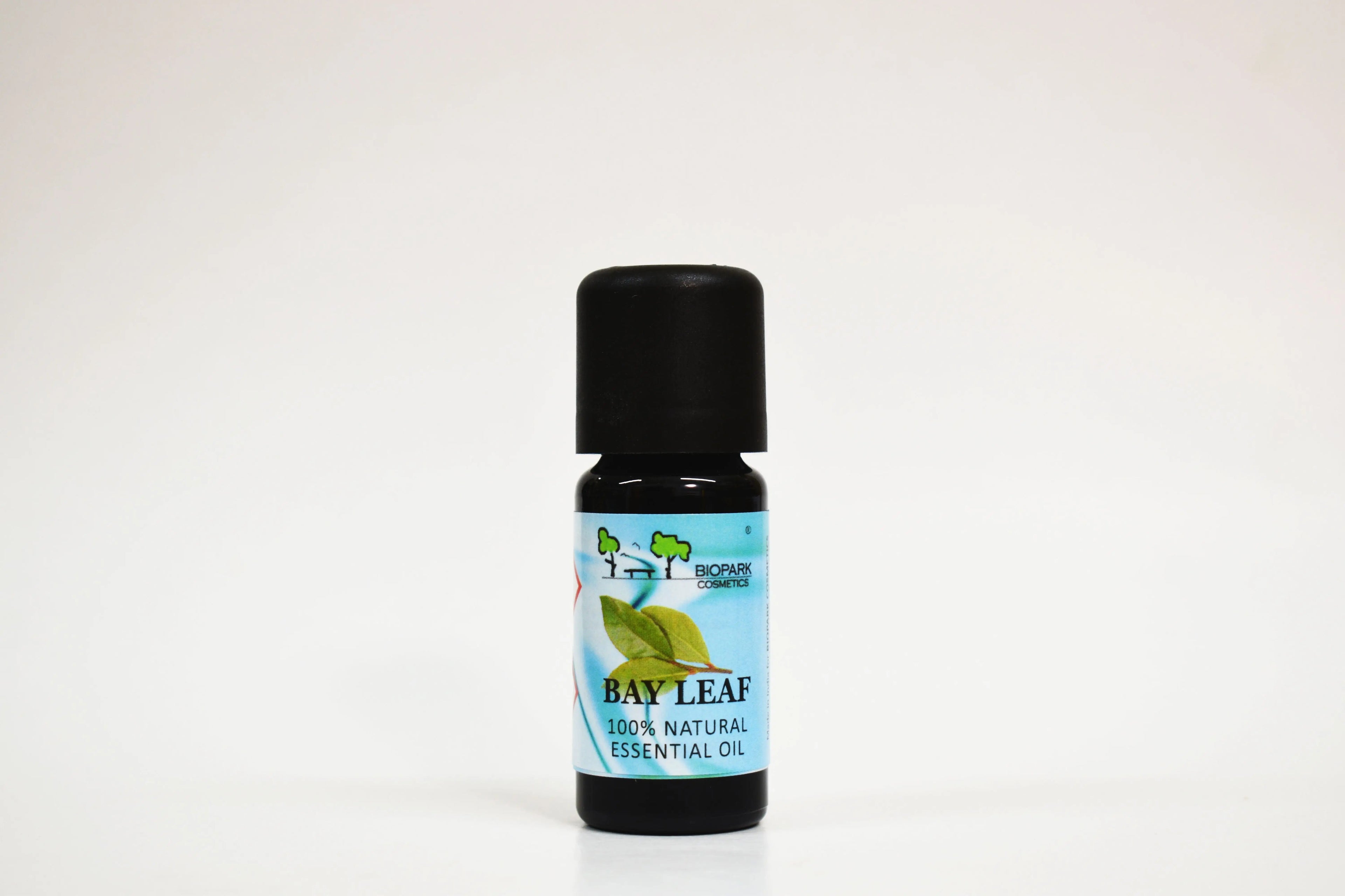 Bay leaf essential oil bottle on a white background