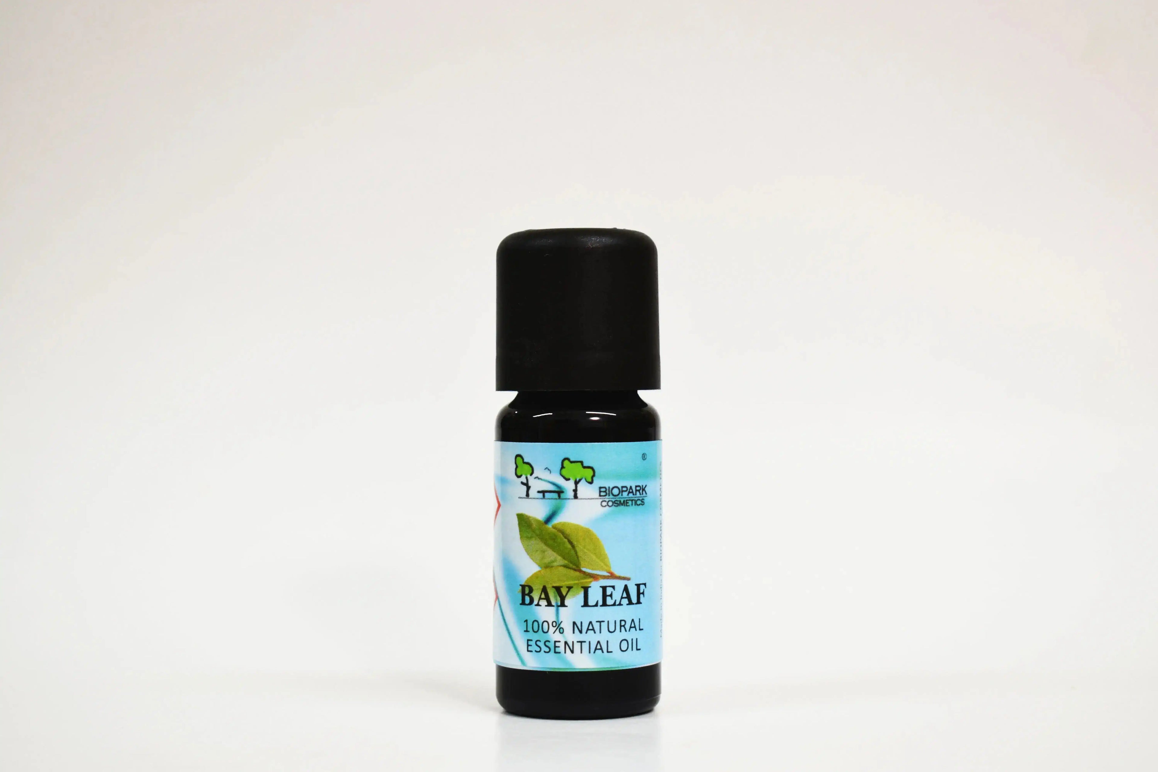Bay leaf essential oil bottle on a white background