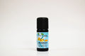 Bottle of benzoin essential oil on a white background
