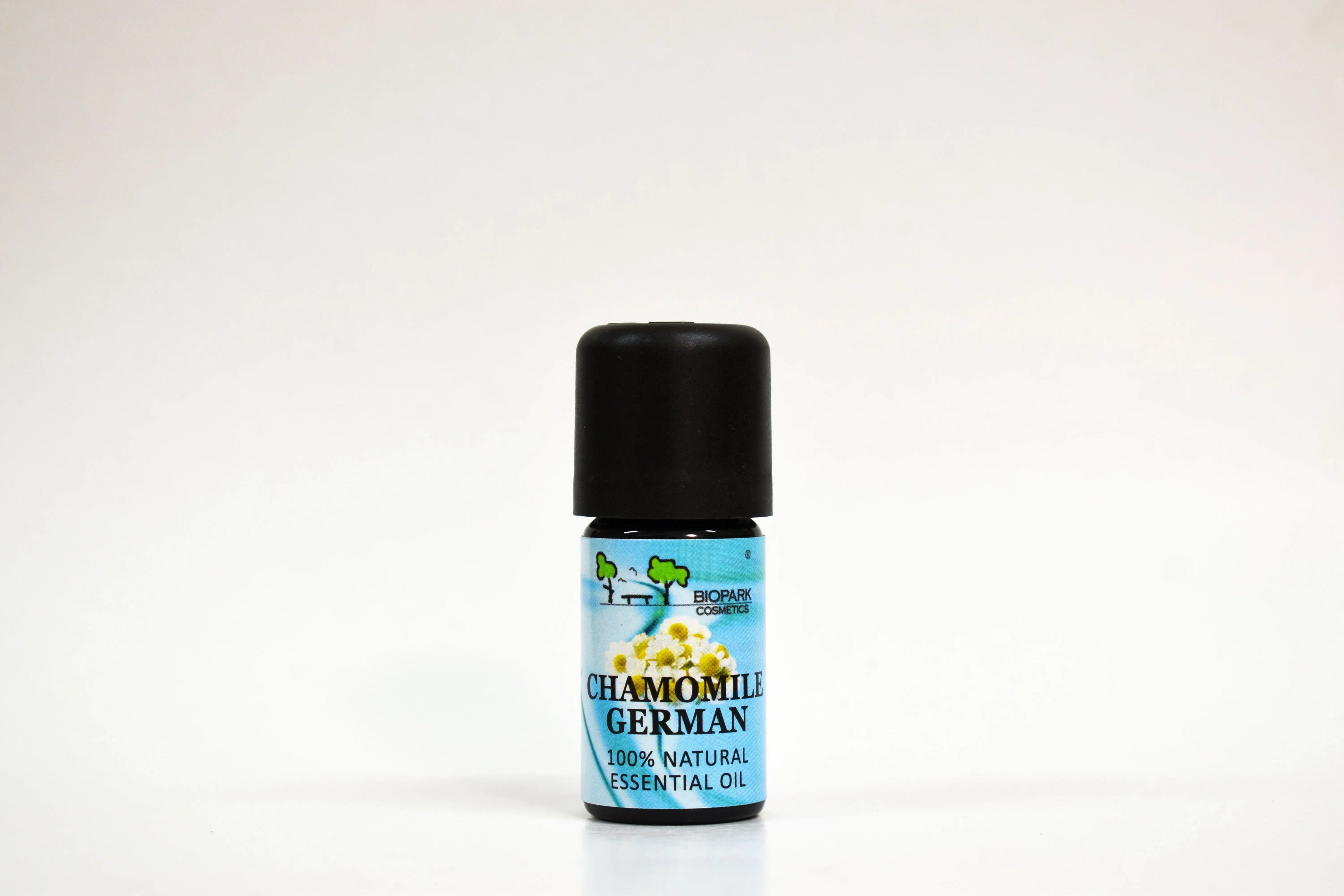 Chamomile German essential oil bottle on a white background