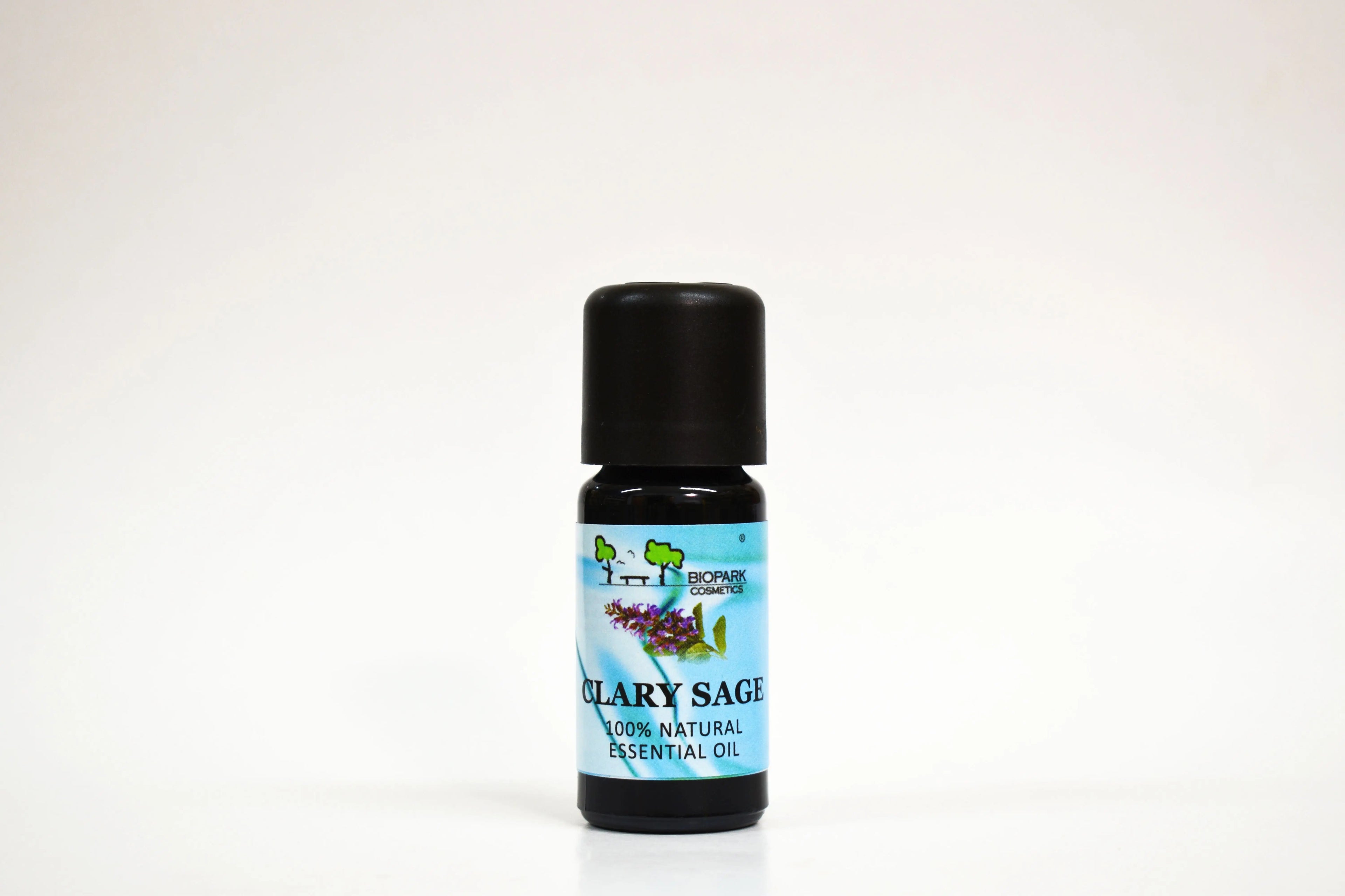 Bottle of thyme essential oil with a blue label on a white background