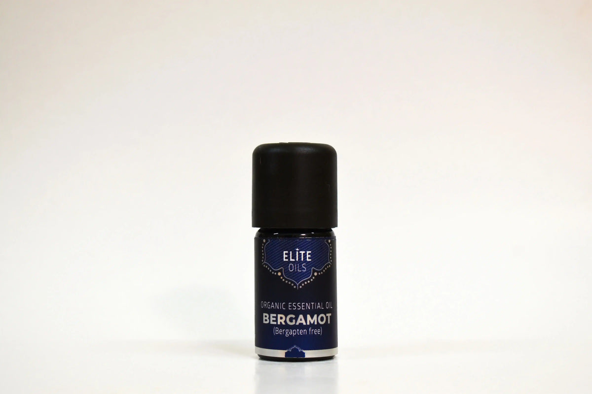 Bottle of Elite Oils Bergamot essential oil on a white background