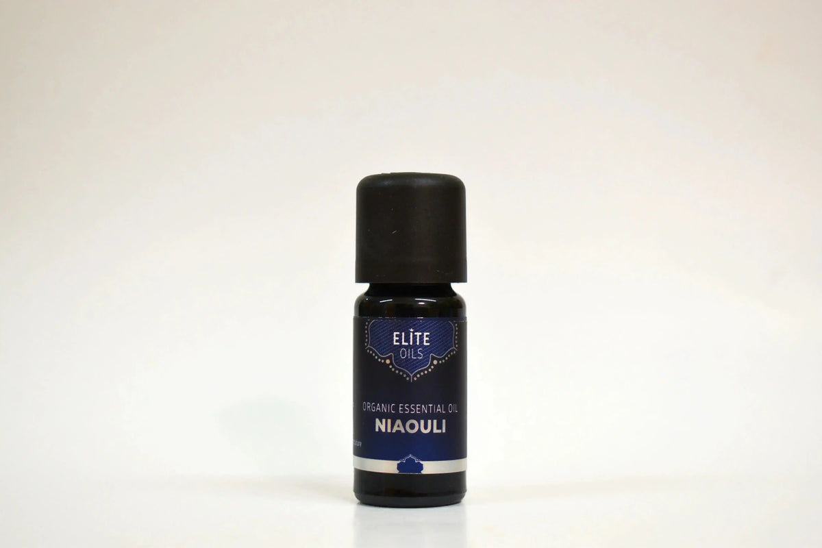 Bottle of Elite Oils Niaouli essential oil on a white background