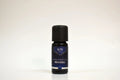 Bottle of Elite Oils Niaouli essential oil on a white background