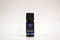 Bottle of Elite Oils Rosemary essential oil on a white background