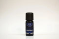 Bottle of Elite Oils Rosemary essential oil on a white background