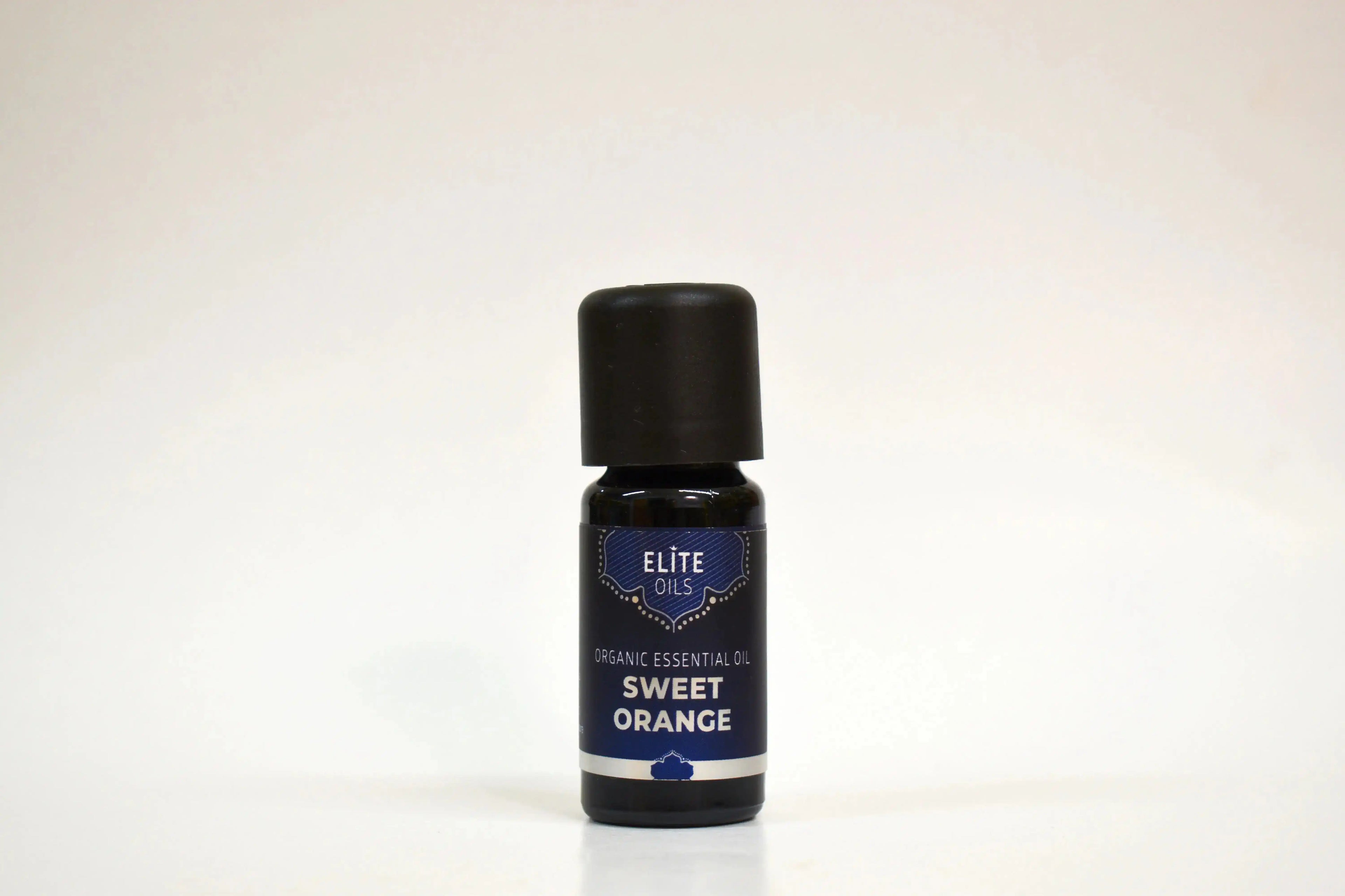 Bottle of Elite Oils Sweet Orange essential oil on a white background