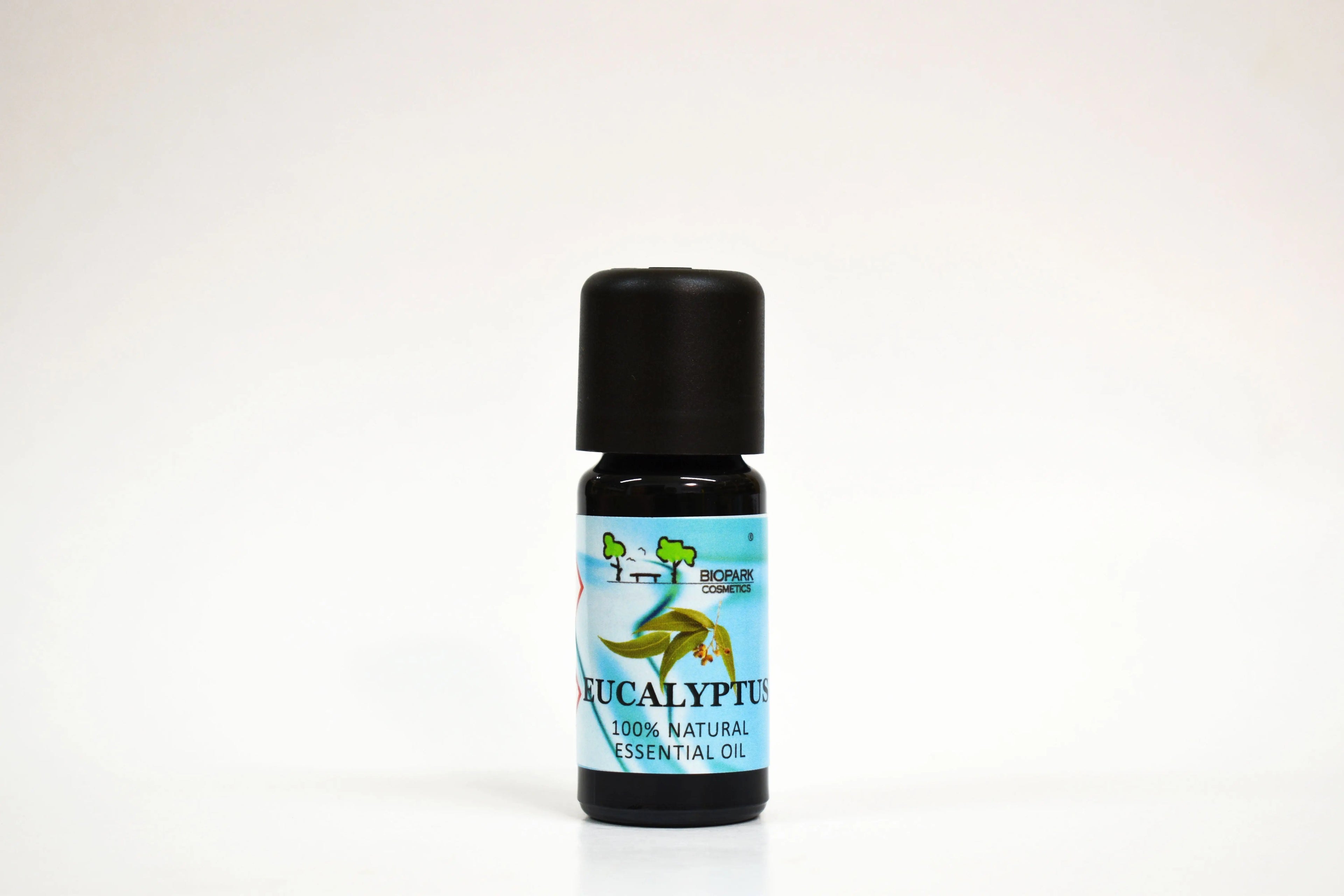 Bottle of eucalyptus essential oil on a white background