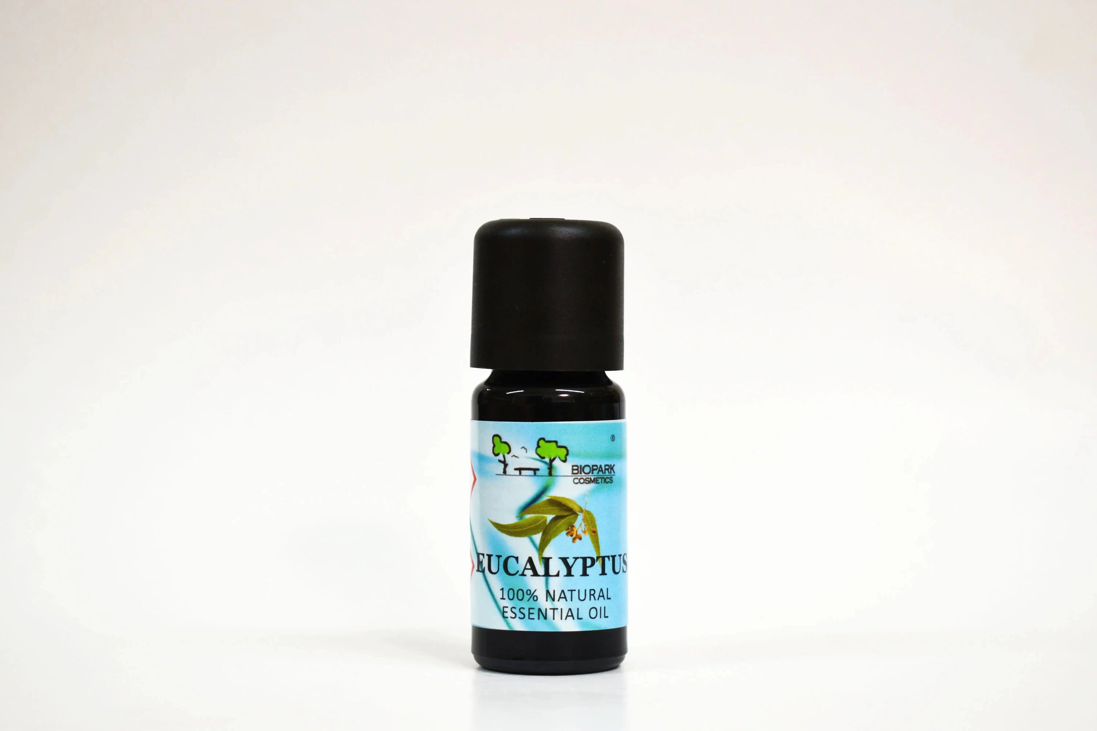Bottle of eucalyptus essential oil on a white background