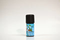Essential oil bottle with a blue label on a white background
