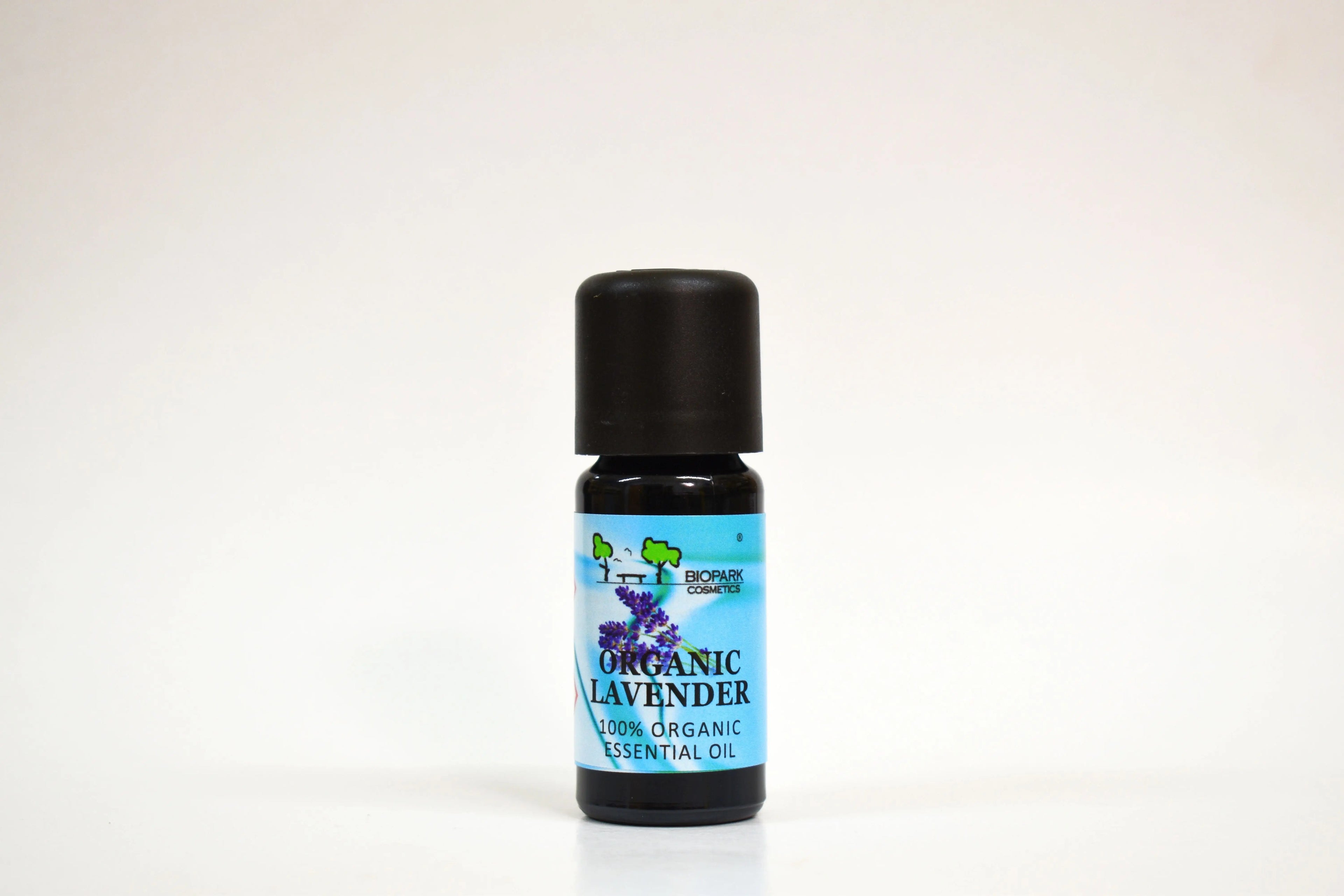 Bottle of organic lavender essential oil on a white background