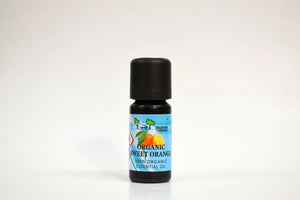 Bottle of organic sweet orange essential oil on a white background