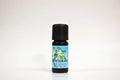 Bottle of Petitgrain essential oil on a white background