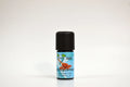 Bottle of Sandalwood essential oil on a white background