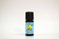 Ylang Ylang essential oil bottle on a white background