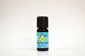 Lemongrass essential oil bottle on a white background