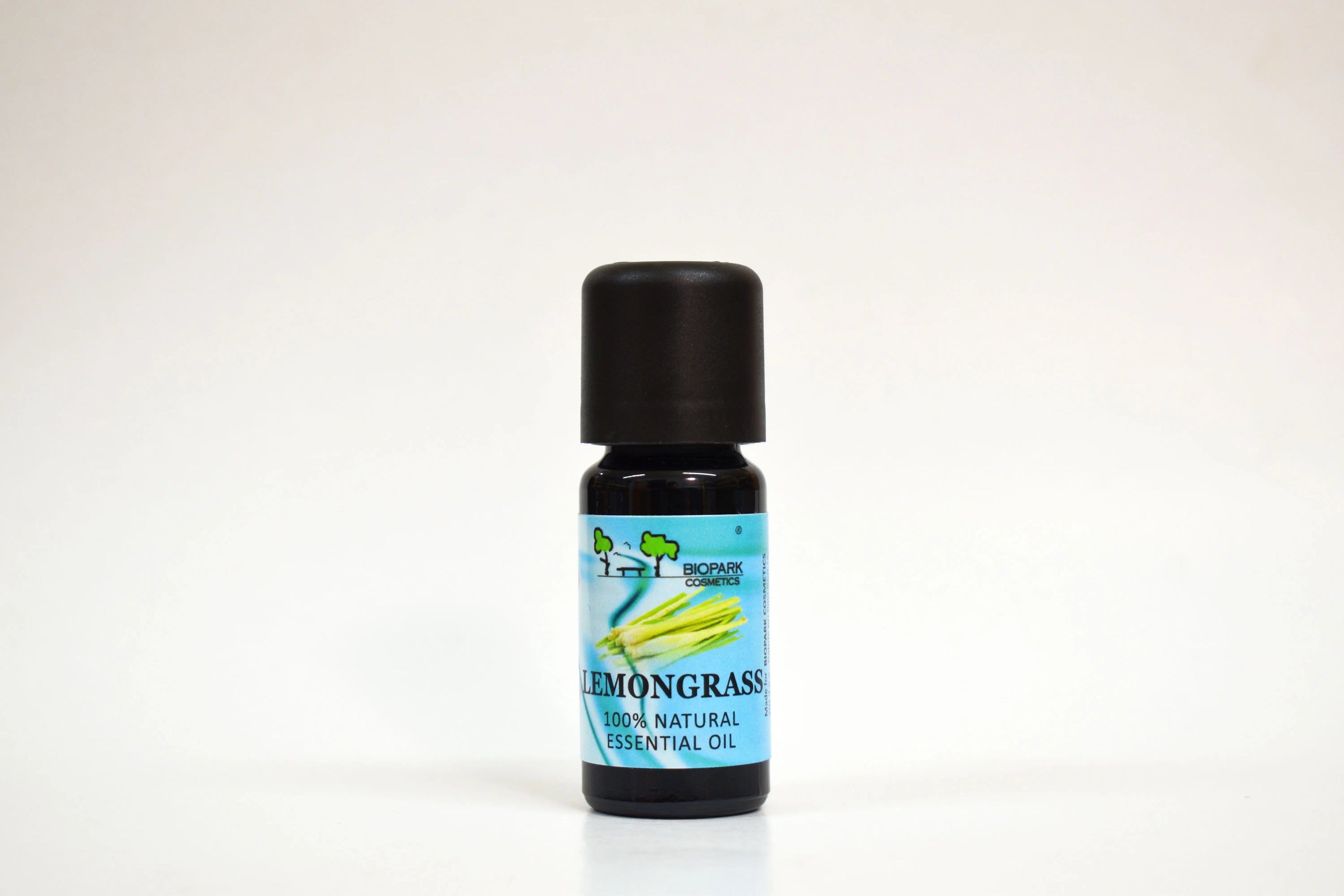 Lemongrass essential oil bottle on a white background