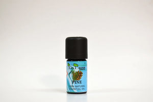 Bottle of pine essential oil on a white background