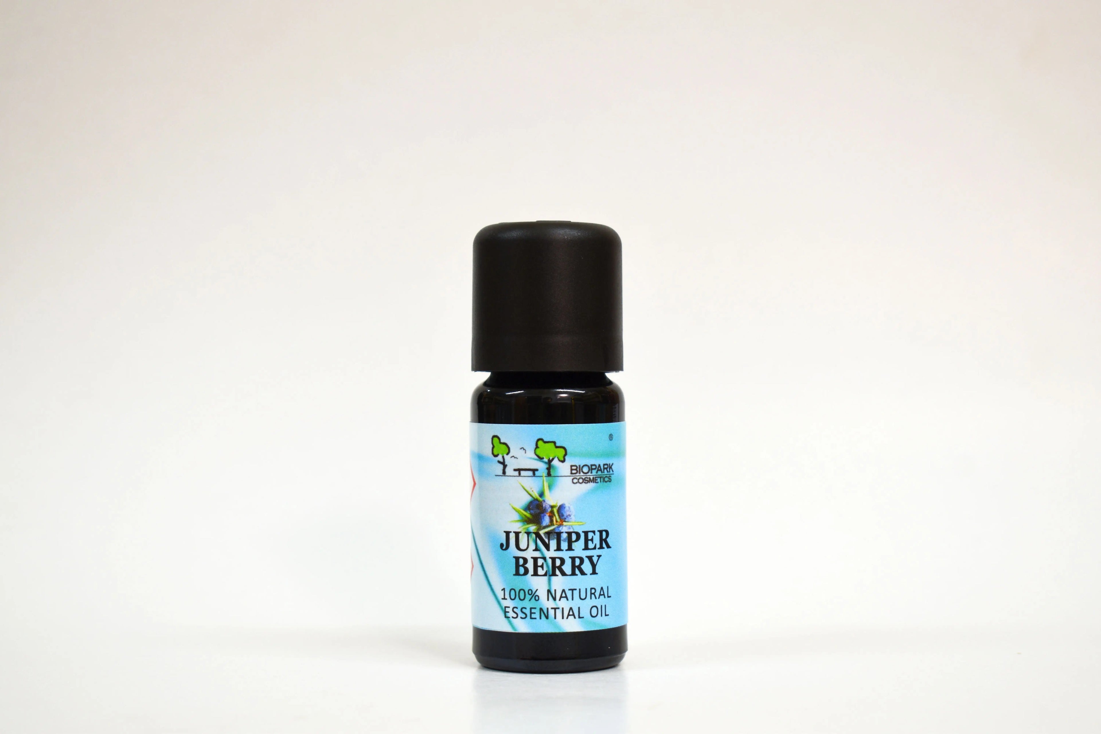 Bottle of Juniper Berry essential oil on a white background