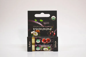 Packaging of Yummie chocolate bars with visible branding on a white background