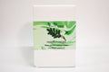 Box of Indigo Powder with green leaf design on a white background