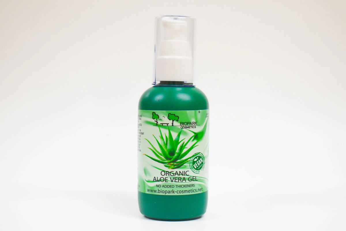 Bottle of organic aloe vera gel on a white background