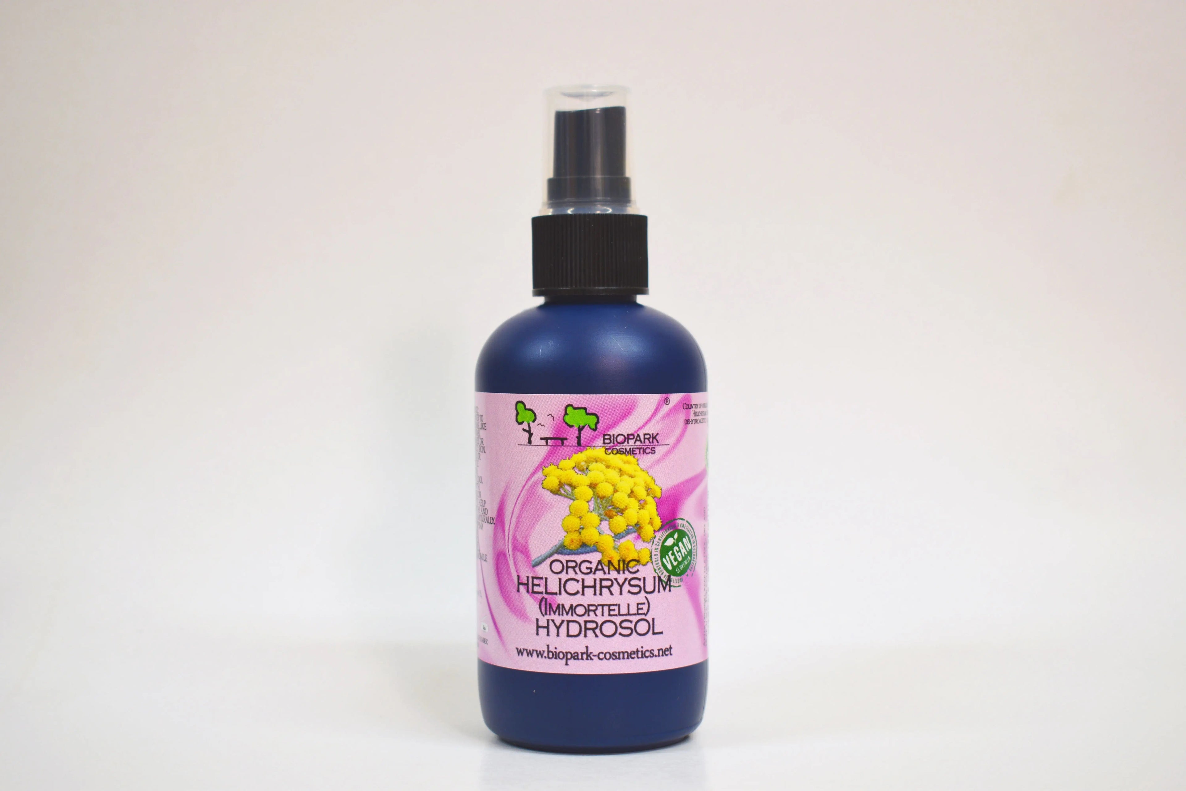 Bottle of organic helichrysum hydrofol on a white background