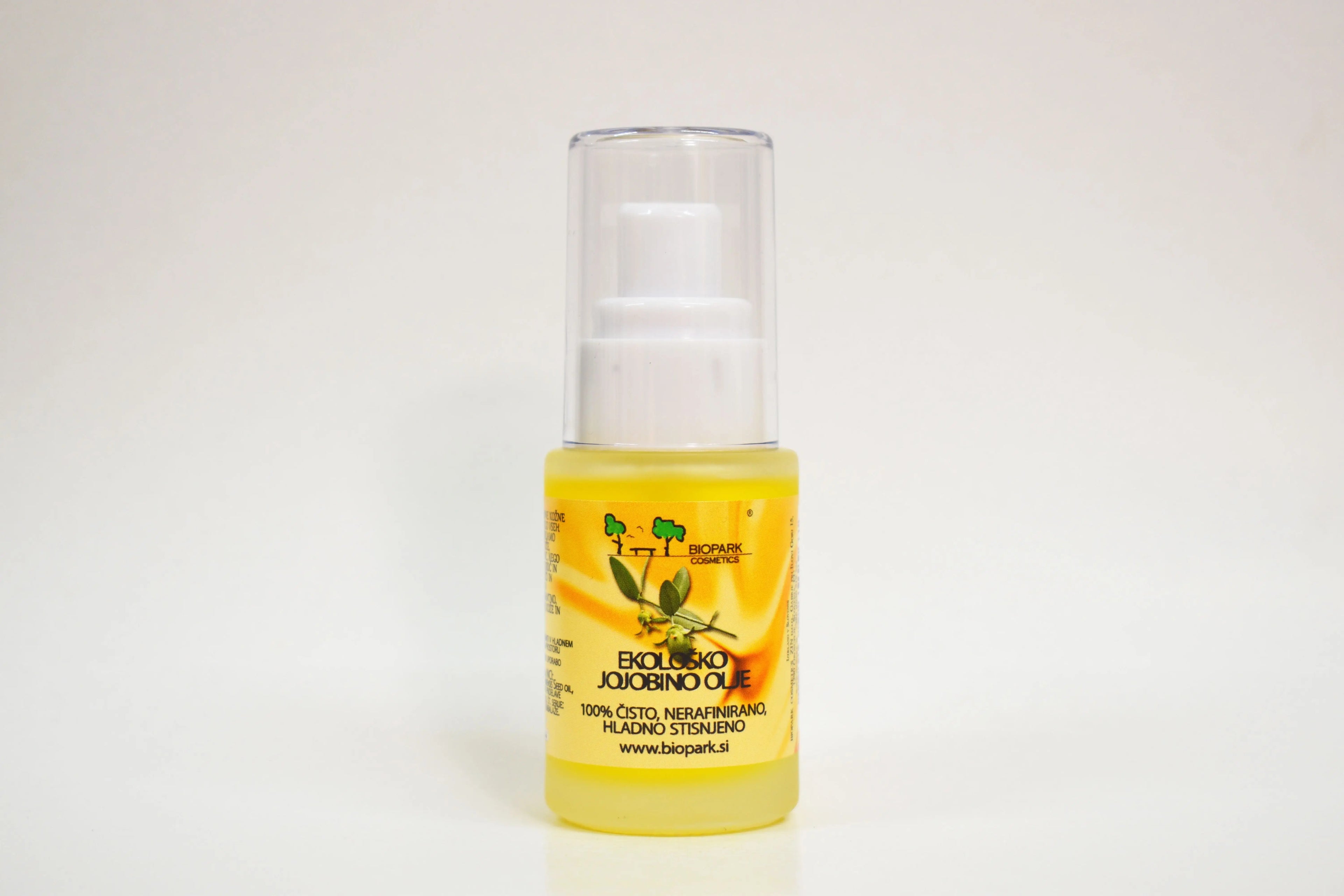 Bottle of biological olive oil on a white background