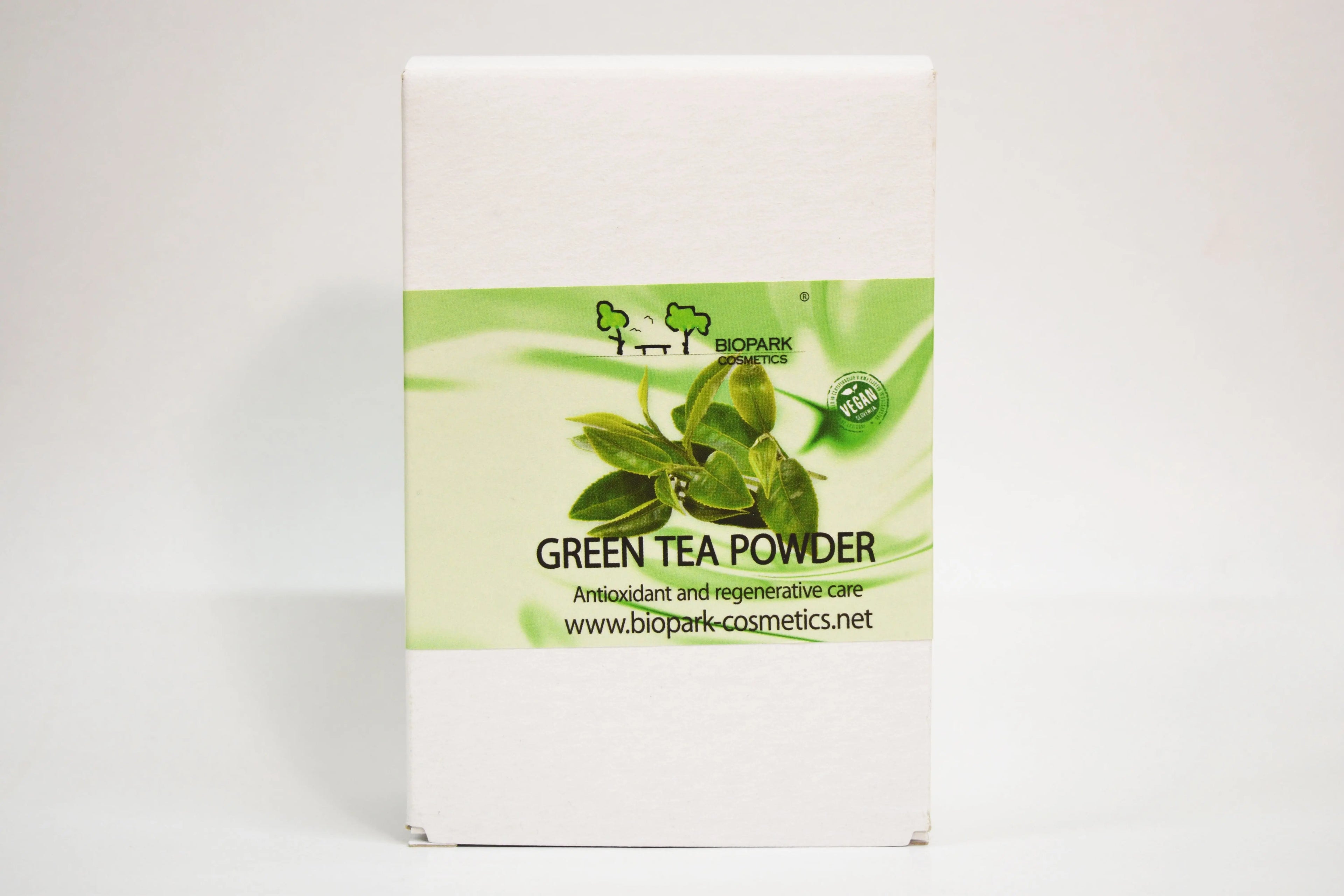 Box of green tea powder with a green tea leaf graphic on a white background