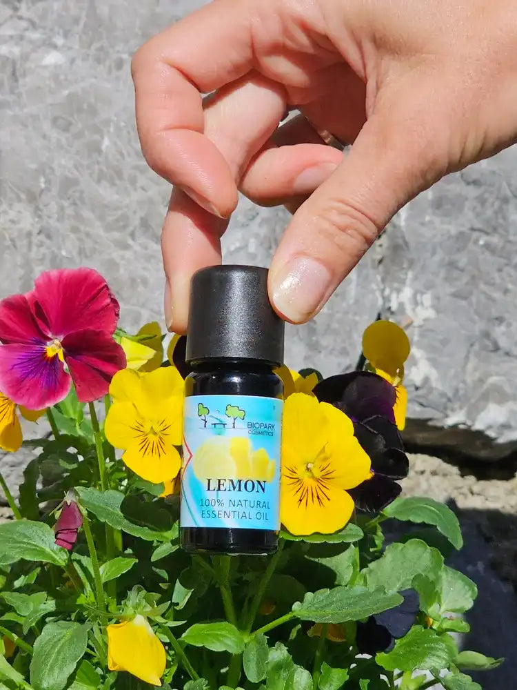 biopark cosmetics leom essential oil infront of flowers