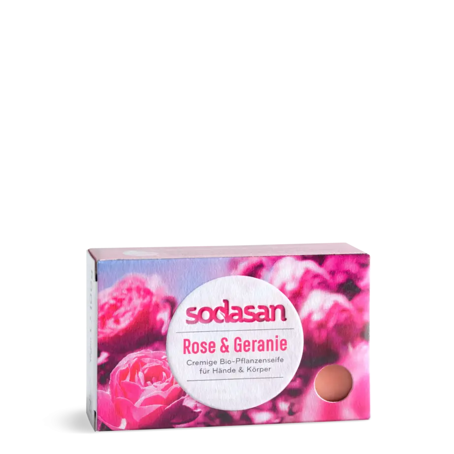 Sodasan Rose & Geranium hand and body cream soap in a rectangular box with a pink rose floral design and a central white oval label.