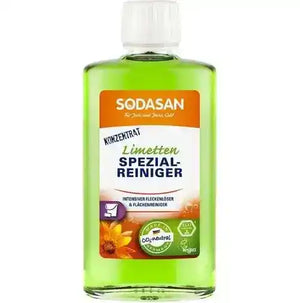 Sodasan cleaning concentrate bottle with green liquid on a white background