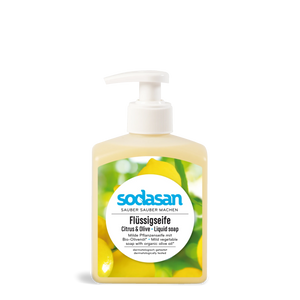 A bottle of Sodasan Citrus & Olive Liquid Soap with a white pump dispenser, featuring a label with yellow citrus and green olive leaves on a white background.